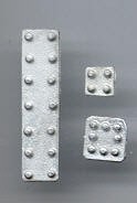 Show details for Riveted patches for rust holes Picture of Riveted patches for rust holes