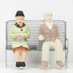 Show details for Pensioner (w) sitting with a bag Picture of Pensioner (w) sitting with a bag