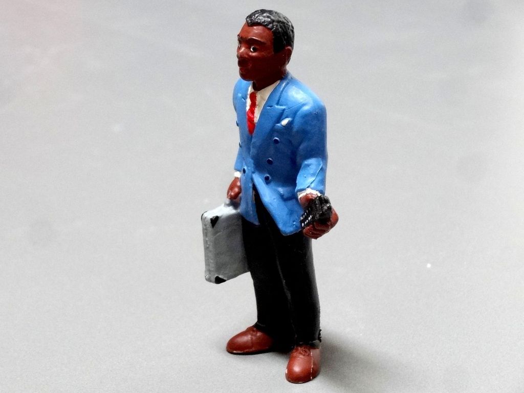 Geschäftsmann mit Handy Höhe 80 mm